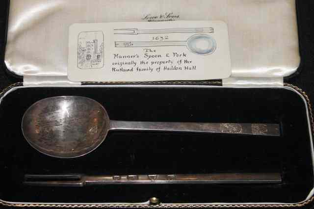 Appraisal: A PAIR OF MODERN SILVER REPRODUCTIONS of the Manners spoon