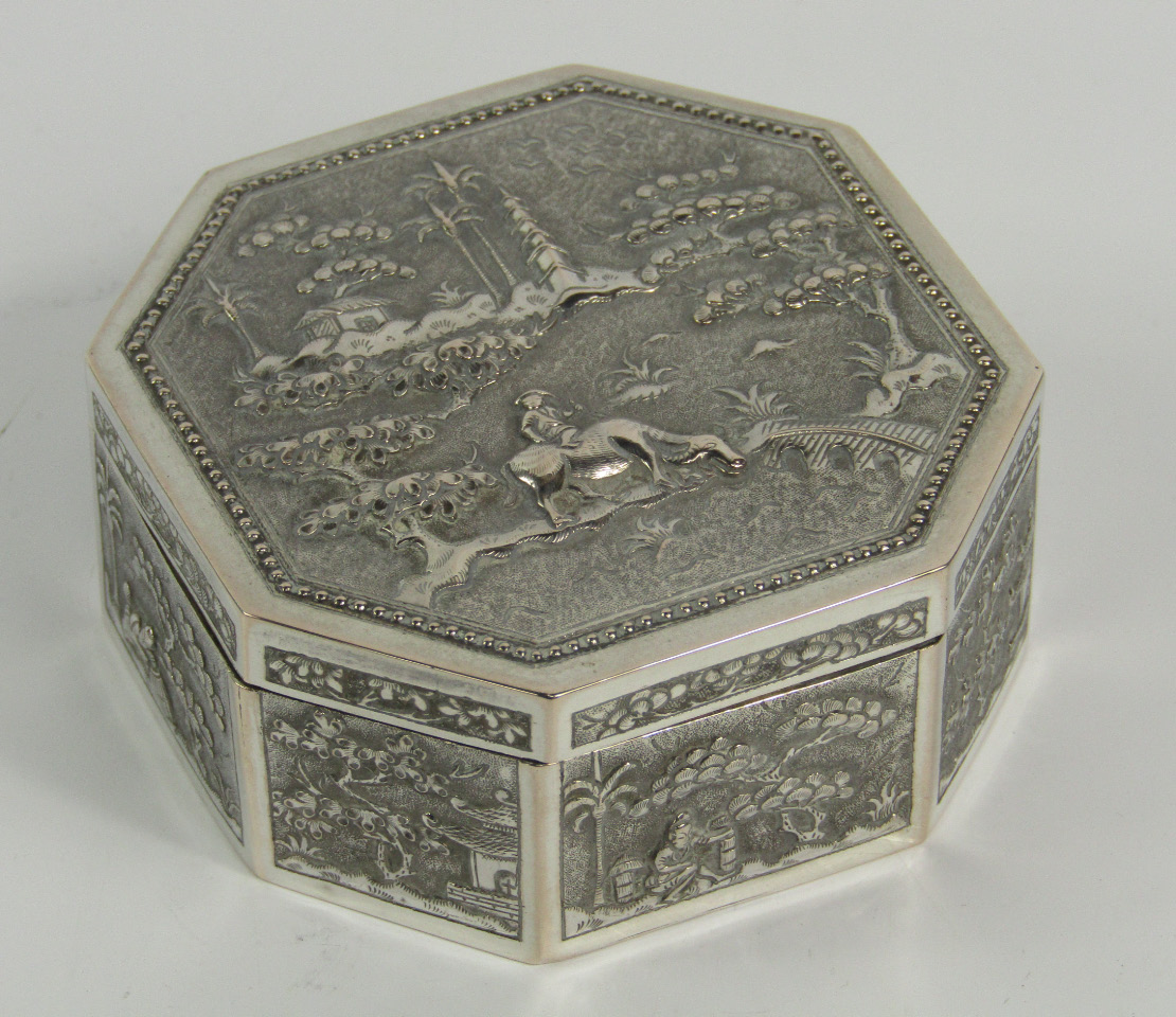 Appraisal: A Chinese white metal box of octagonal form decorated to