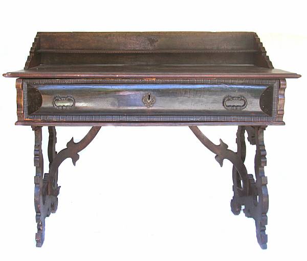 Appraisal: A Spanish Baroque style standing butler's desk incorporating antique elements