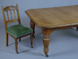 Appraisal: A late Victorian oak wind-out extending dining table the moulded