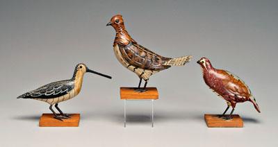 Appraisal: Three Carl Forslund decoys carved and painted grouse - in