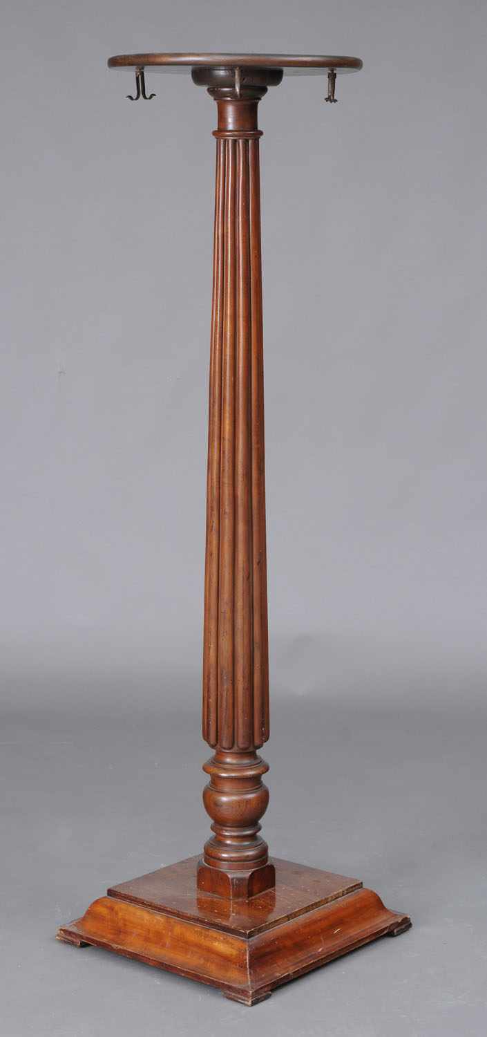 Appraisal: VICTORIAN CARVED MAHOGANY COAT RACK The circular rotating top fitted