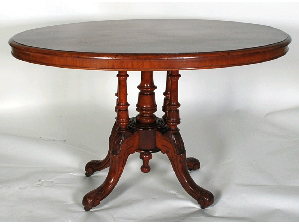 Appraisal: VICTORIAN CARVED MAHOGANY LOO TABLE the oval moulded tilt top