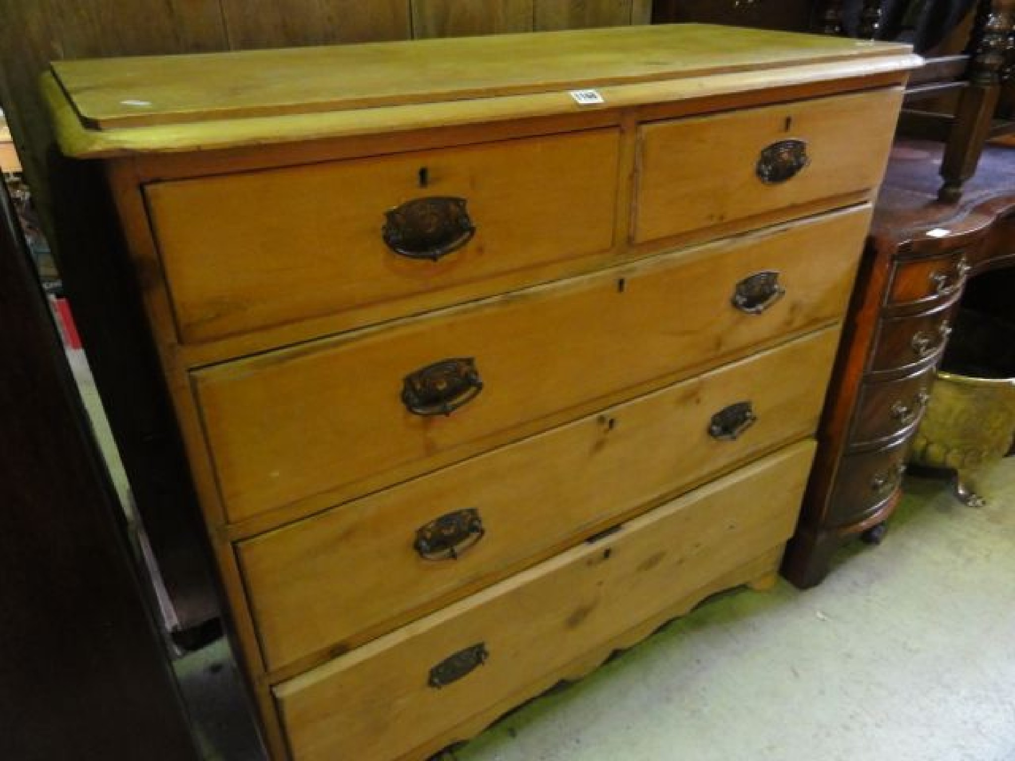 Appraisal: A late Victorian stripped pine bedroom chest of three long