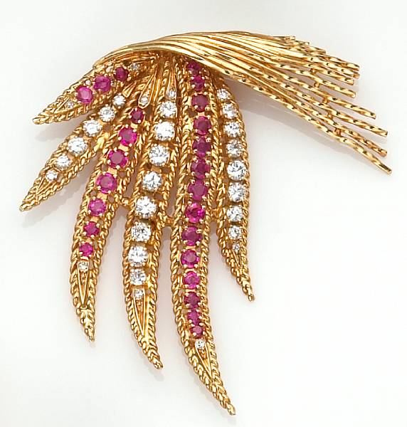 Appraisal: brooch in a fern motif set with circular-cut rubies round