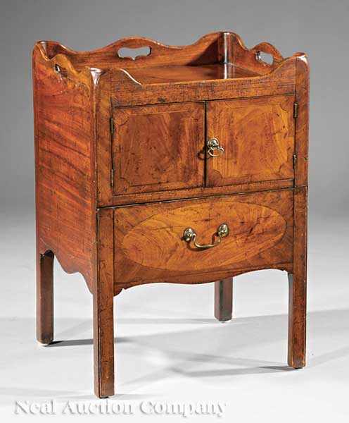 Appraisal: A Georgian Mahogany Inlaid Commode shaped tray top above two