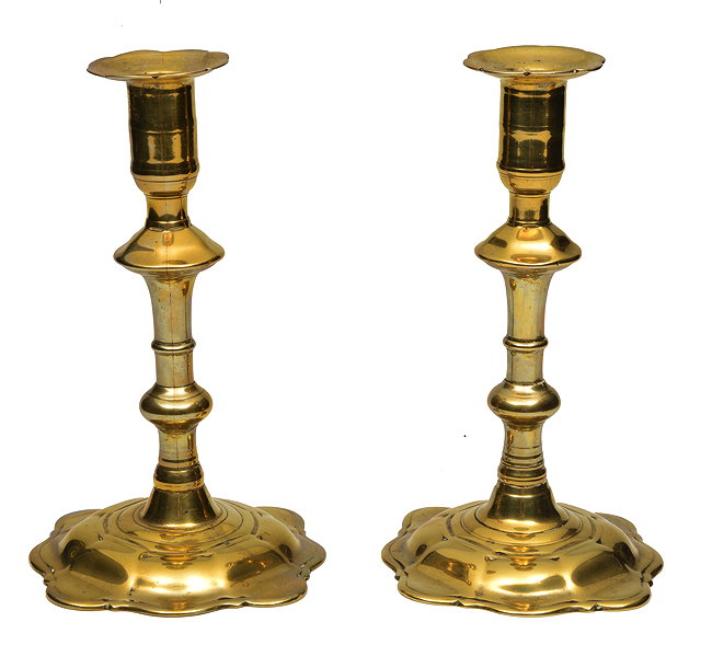 Appraisal: A PAIR OF TH CENTURY BRASS CANDLESTICKS with double knop