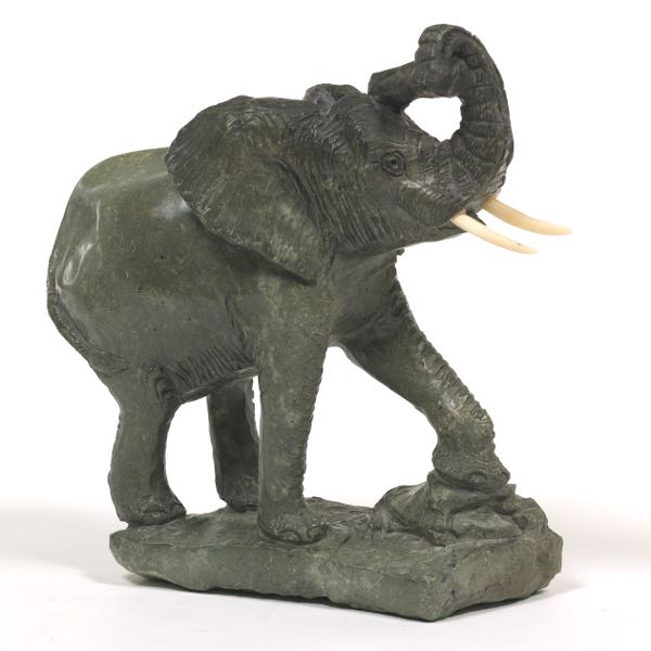 Appraisal: CARVED HARDSTONE AFRICAN ELEPHANT x x Carved and polished solid