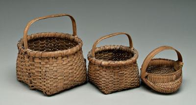 Appraisal: Three oak split baskets miniature egg basket in scattered losses