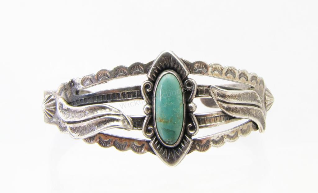 Appraisal: A sterling silver cuff bracelet by Fred Harvey with an