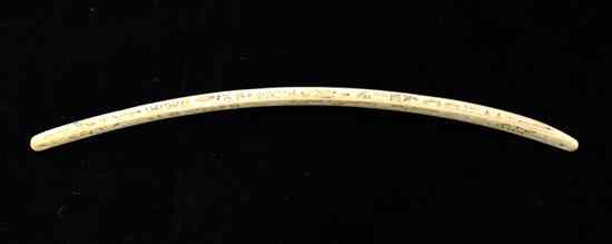 Appraisal: A North American Inuit walrus ivory bow drill engraved with