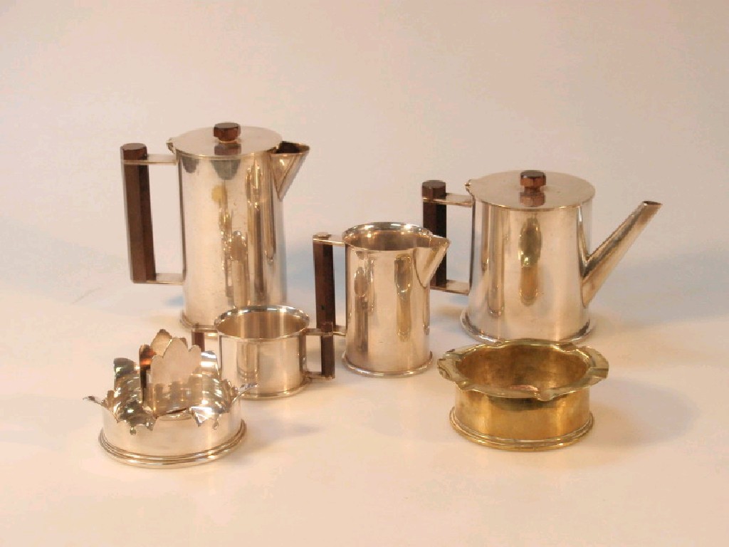 Appraisal: A interesting four piece electroplated tea service made from WWII