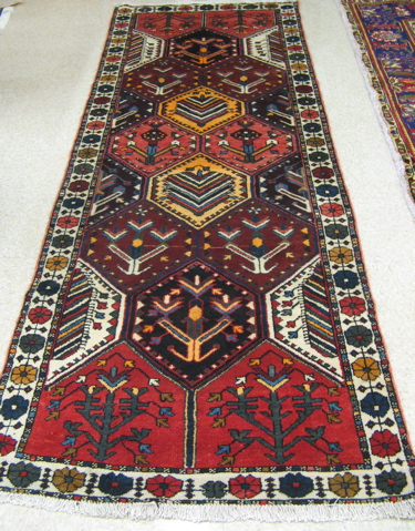 Appraisal: PERSIAN TRIBAL AREA RUG Hamadan Province northwestern Iran repeating multi-color