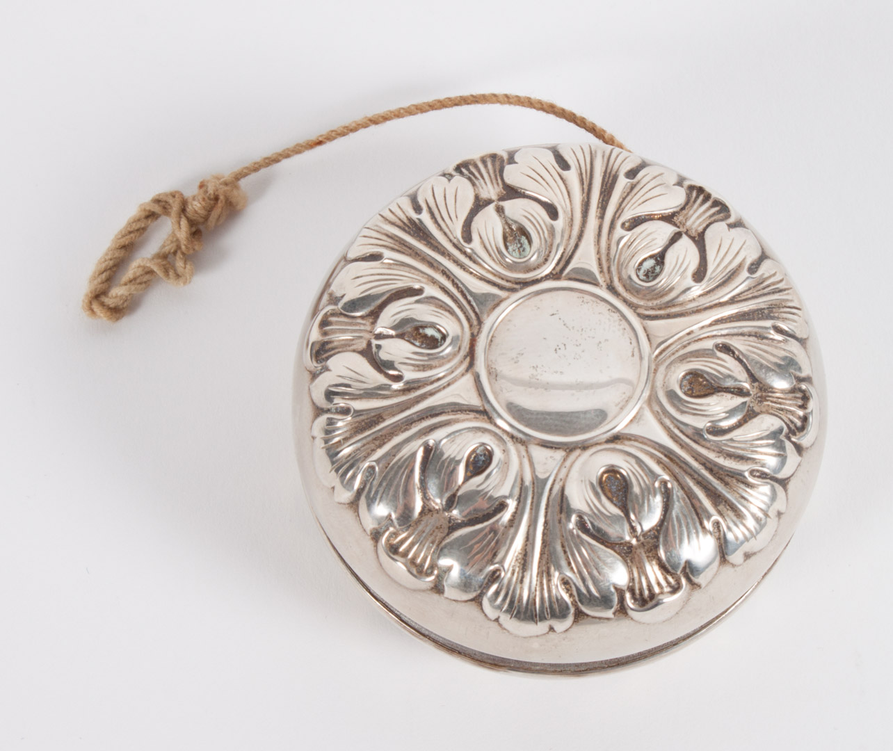 Appraisal: Repousse silver yo-yo