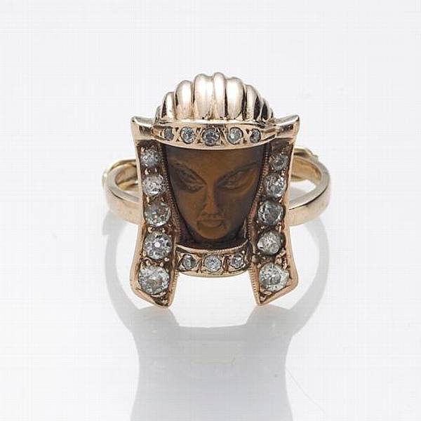 Appraisal: An Egyptian revival tiger's eye diamond and k gold ring