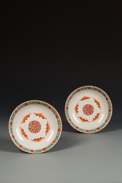 Appraisal: A PAIR OF CHINESE SAUCER DISHES enamelled in iron red