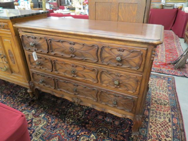 Appraisal: Contential Carved Chest triple drawer th century tall wide deep