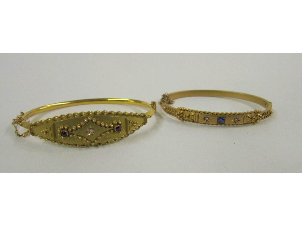 Appraisal: Two Victorian ct gold bangles on with ruby and diamond