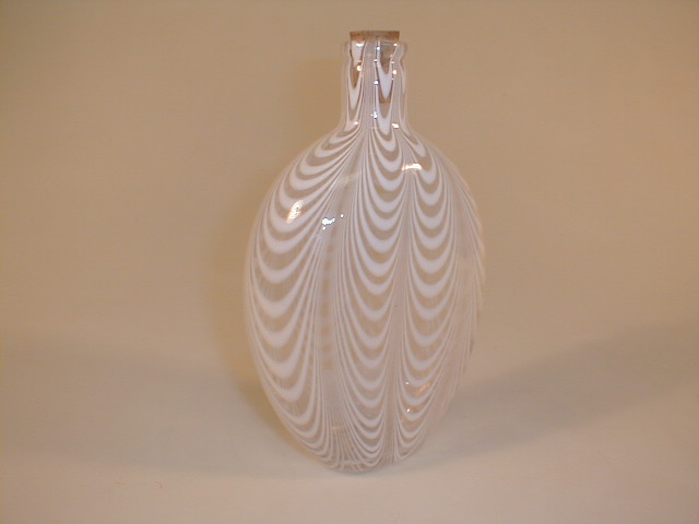 Appraisal: A white and clear glass Nailsea style flask