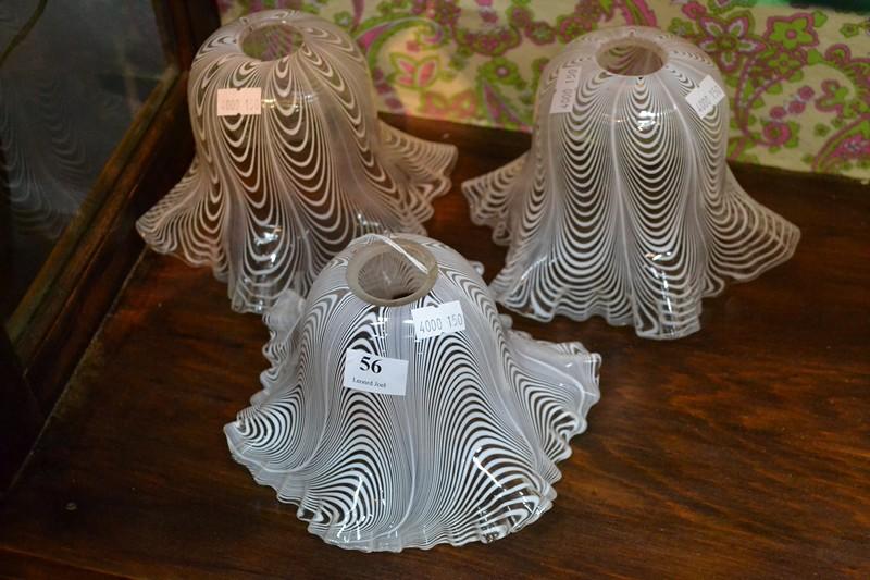 Appraisal: THREE FRILLED NAILSEA GLASS LIGHT SHADES