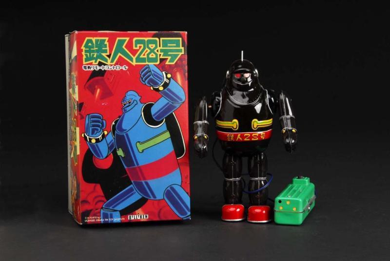 Appraisal: Tin T- Tetsujin Robot Wind-Up Toy Description Japanese Made by