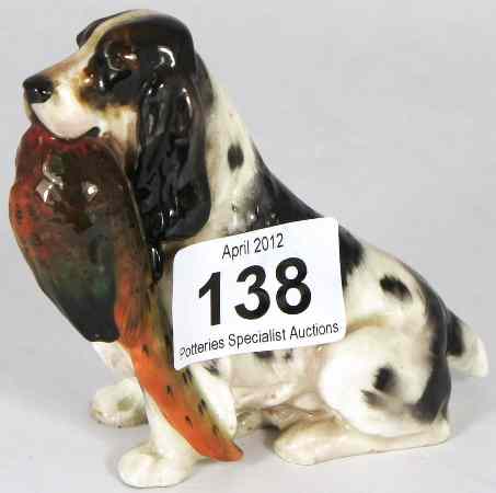 Appraisal: Royal Doulton Figure of a Spaniel Holding a Pheasant HN