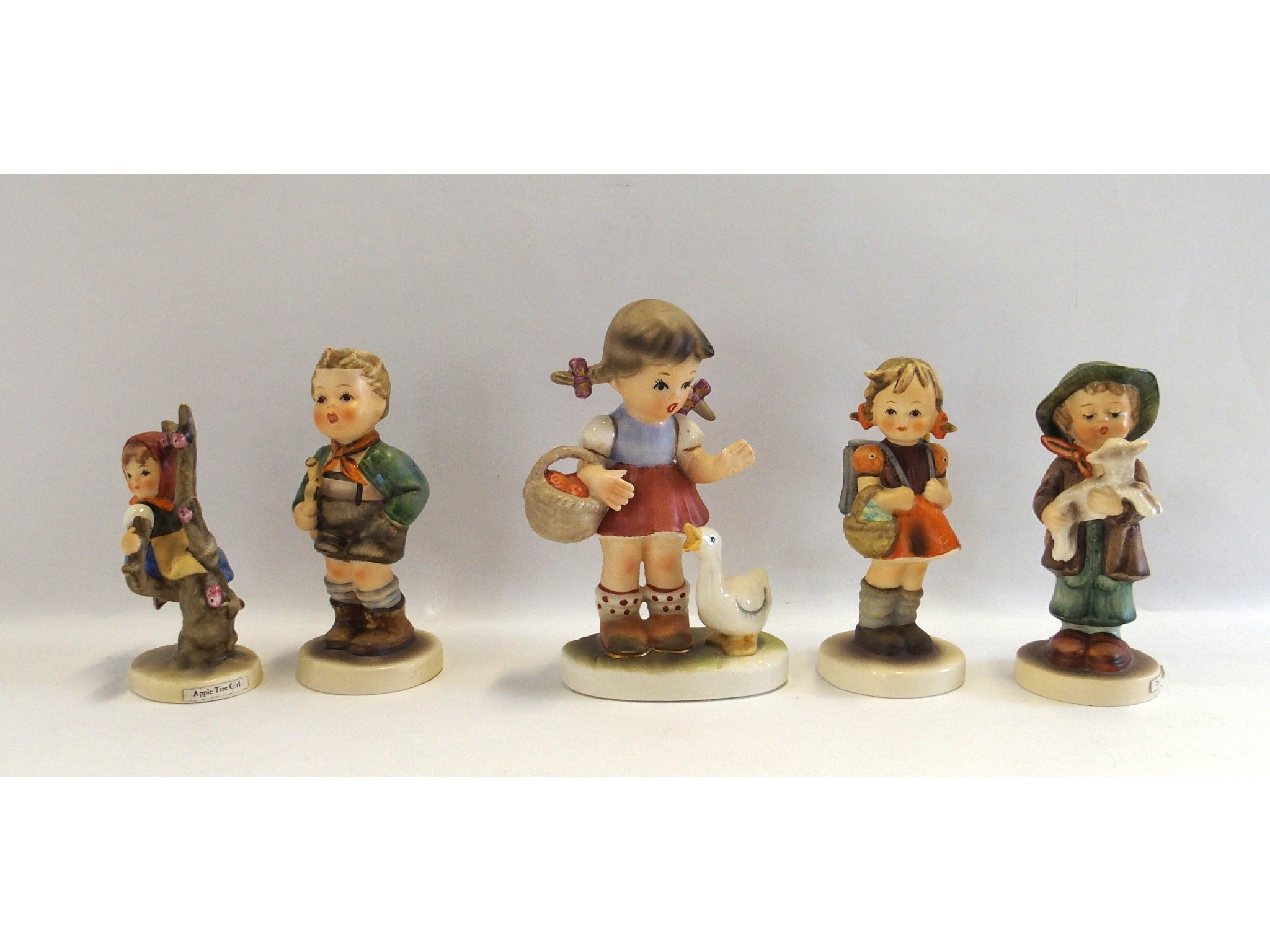 Appraisal: Four Hummel figures including The Lost Sheep Apple Tree Girl