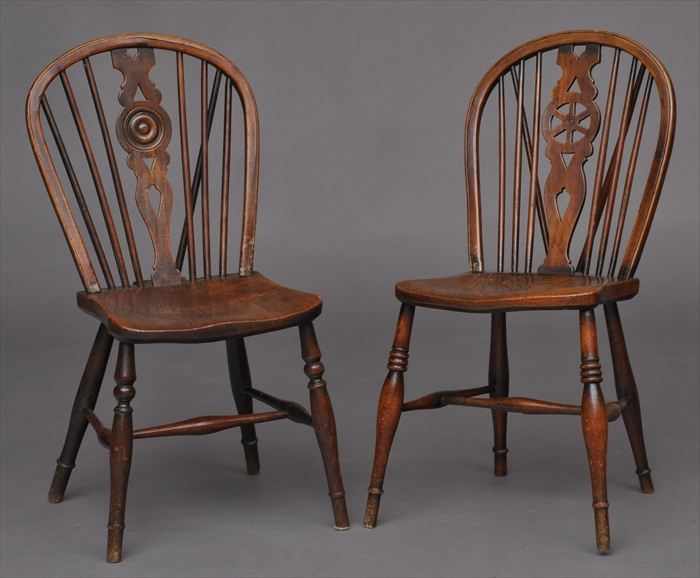 Appraisal: TWO ENGLISH ELMWOOD WHEEL-BACK WINDSOR SIDE CHAIRS Each bowback with