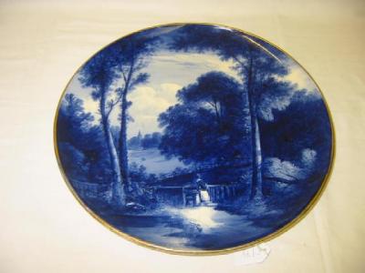 Appraisal: A COPELAND PORCELAIN PLAQUE of circular form blue painted with