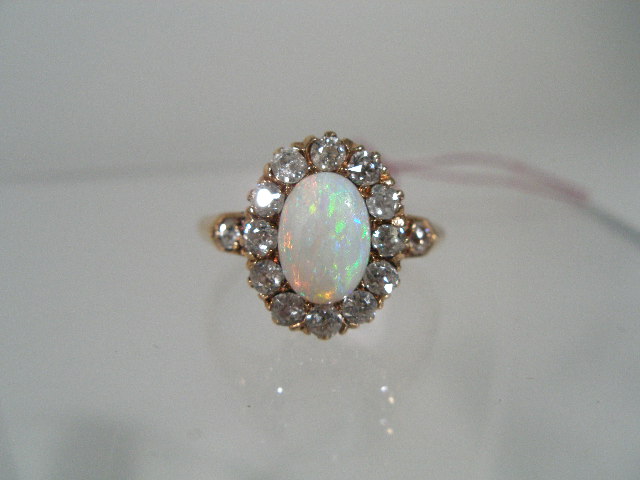 Appraisal: Ladies Opal and Diamond Ring Set th c K yellow