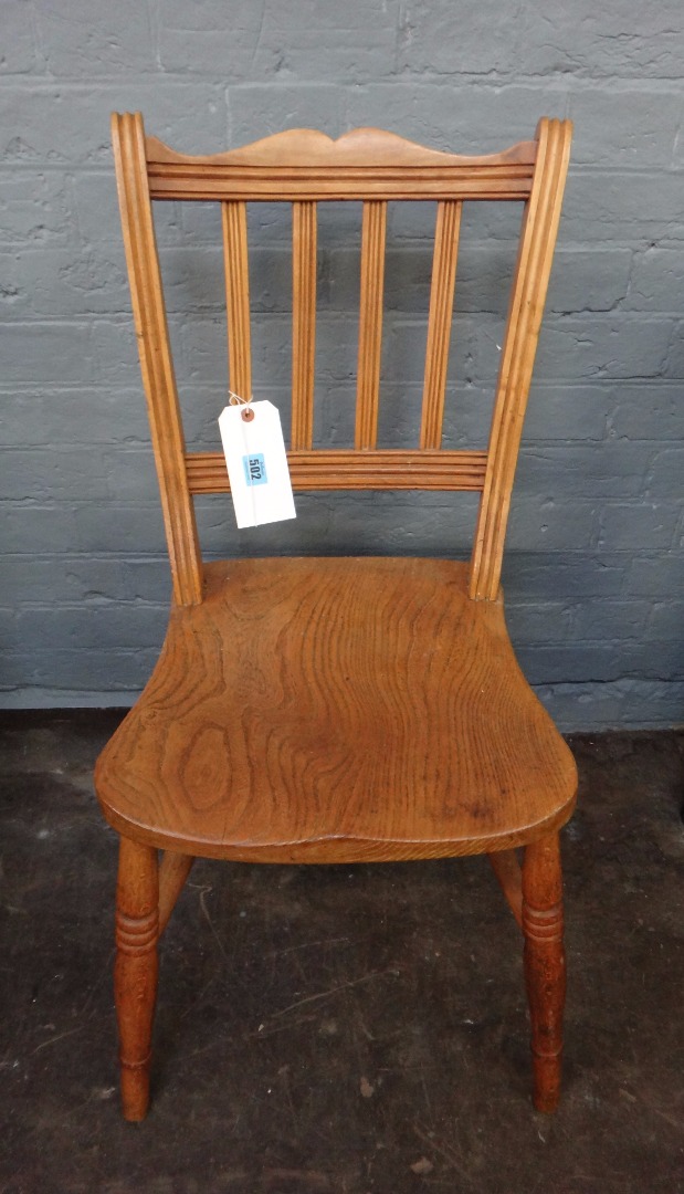 Appraisal: A pair of late Victorian Windsor chairs with elm seats