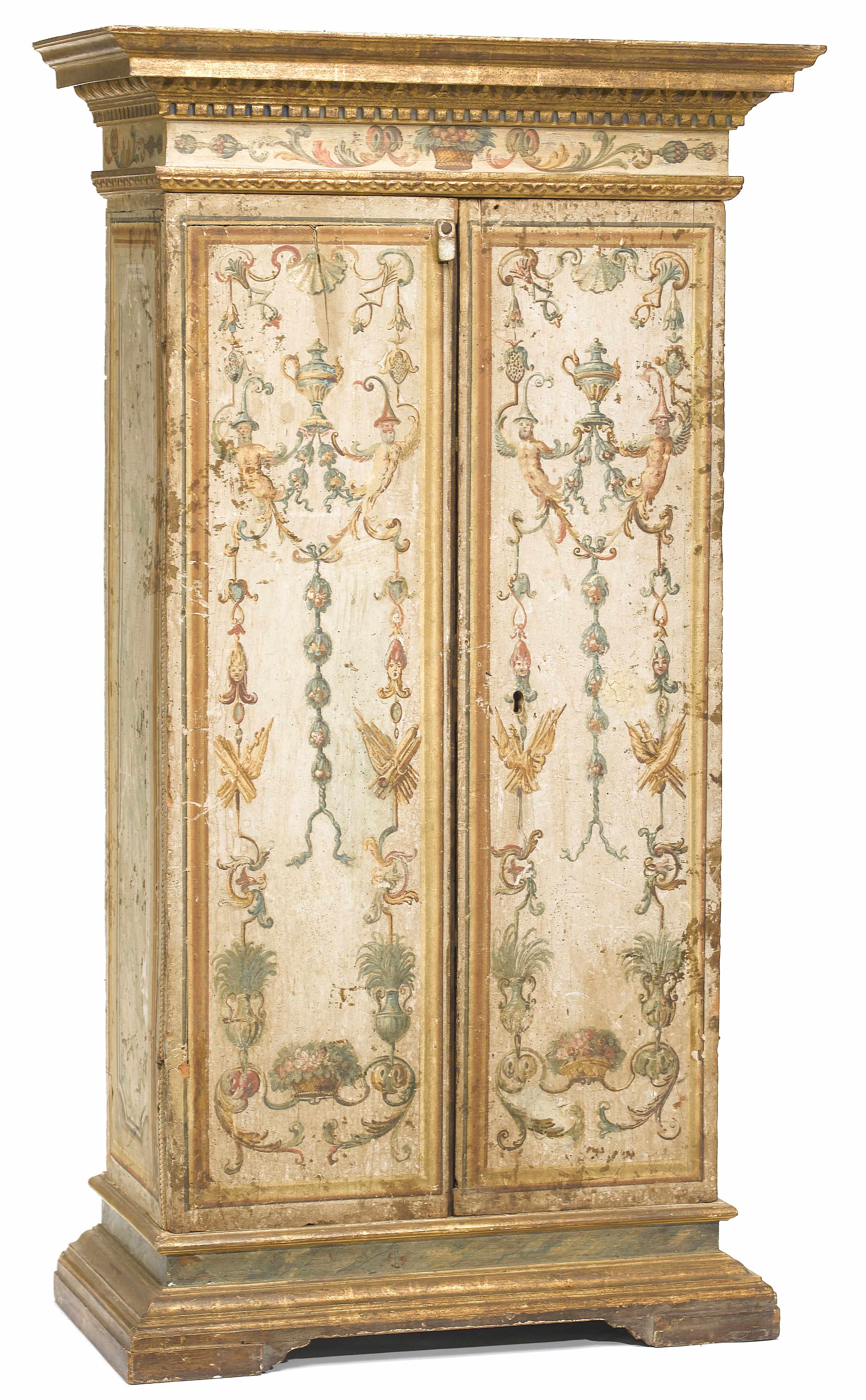 Appraisal: An Italian Baroque parcel gilt and polychrome decorated cupboard early