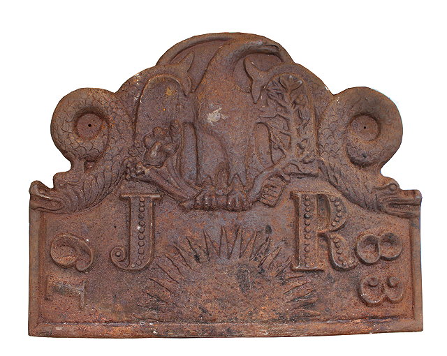 Appraisal: A LARGE HEAVY CAST IRON FIRE BACK decorated with an