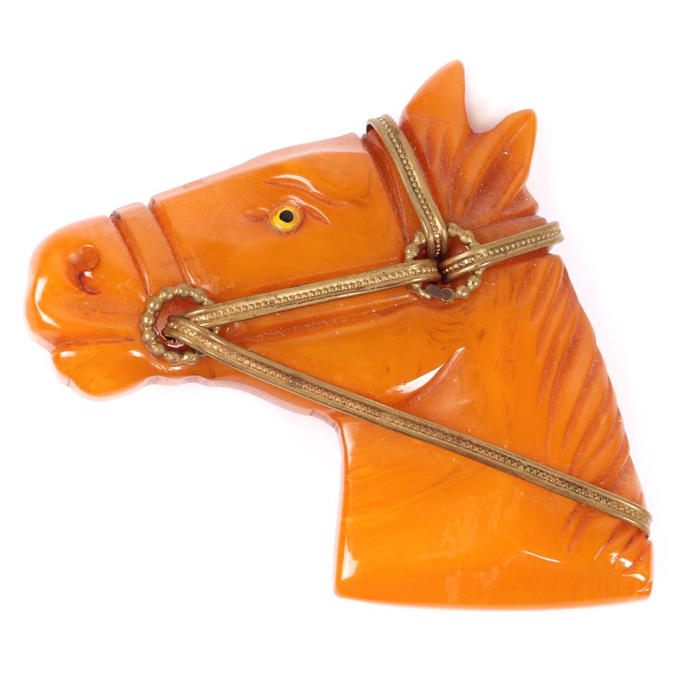 Appraisal: BAKELITE CARVED BUTTERSCOTCH EQUESTRIAN HORSE HEAD FIGURAL PIN BROOCH WITH