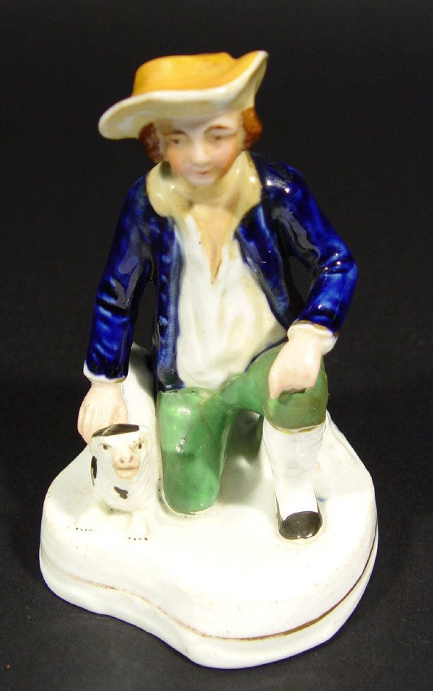 Appraisal: Victorian Staffordshire figure of a crouching gentleman and dog with