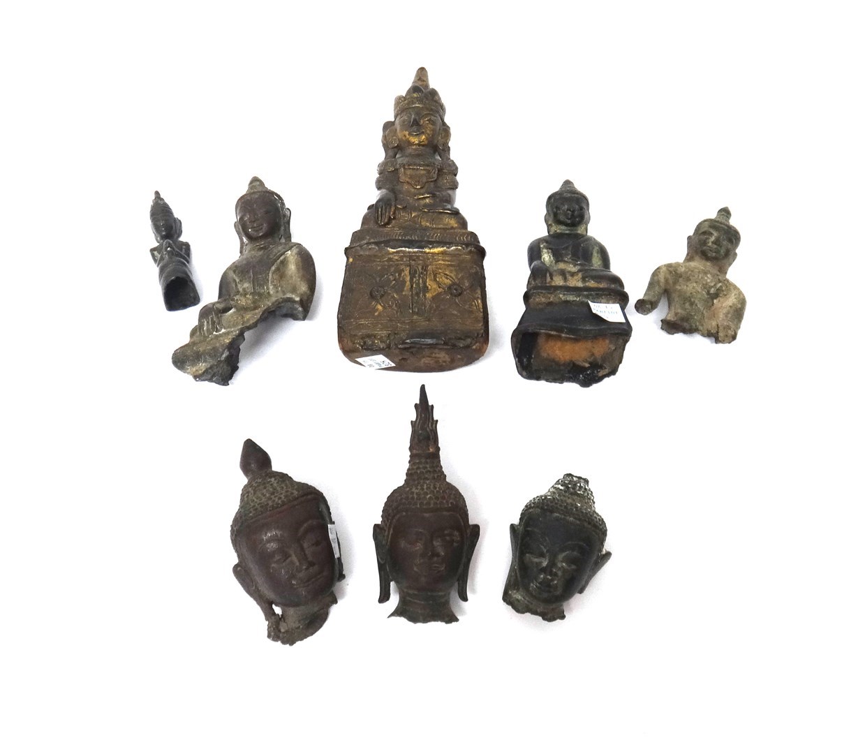 Appraisal: A group of three small Thai bronze buddha heads probably