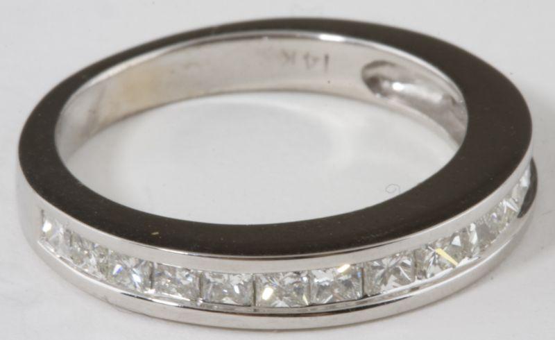 Appraisal: Diamond Wedding Band consisting of princess cut diamonds channel set