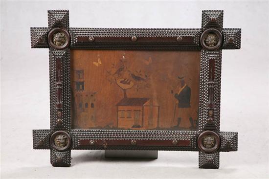 Appraisal: TRAMP ART FRAME Cross corner frame with lion head brasses