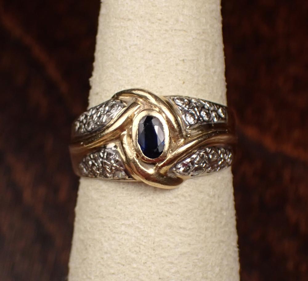 Appraisal: SAPPHIRE DIAMOND AND FOURTEEN KARAT GOLD RING The yellow and