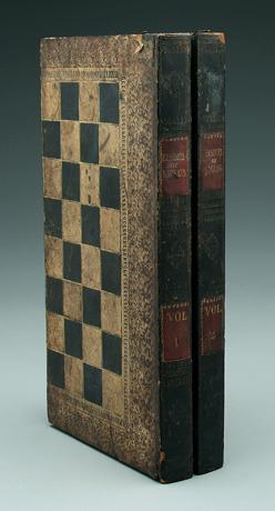 Appraisal: Leather games board formed as two-volume book marbled foreedges exterior