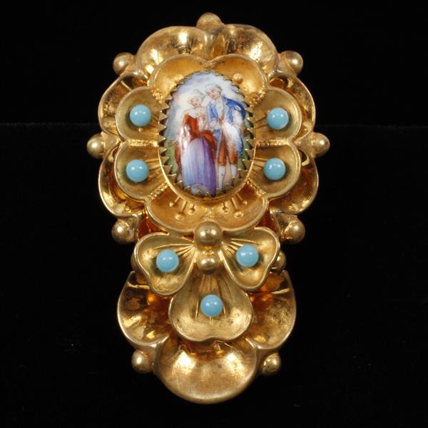 Appraisal: Vintage brass fur clip brooch with turquoise glass cabochons and