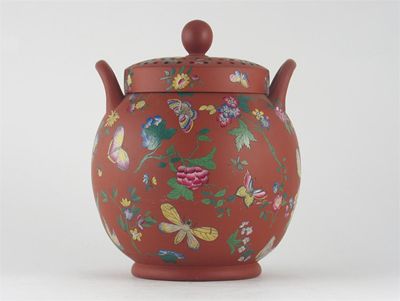 Appraisal: A redware globular pot pourri vase and cover decorated with