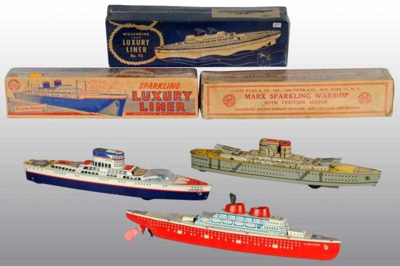 Appraisal: Lot of Tin Boat Toys Description American Working Includes one