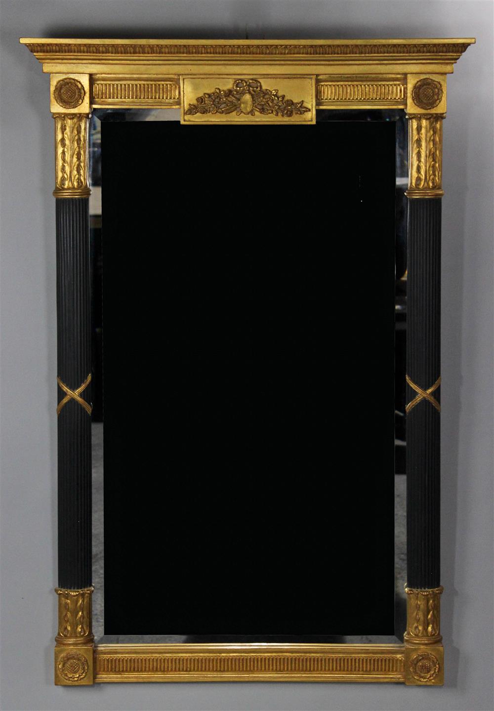 Appraisal: CARVERS GUILD FLUTED SHERATON STYLE GILT AND EBONIZED PIER MIRROR