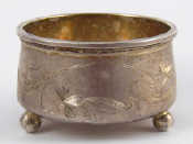 Appraisal: A Russian silver salt with engraved decoration Marks uncertain circa