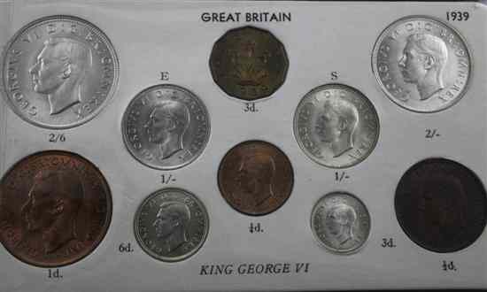 Appraisal: An album of George VI - coin sets Estimate -