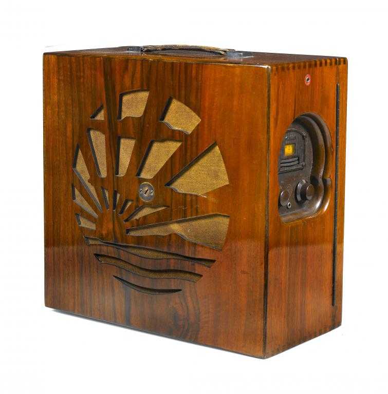 Appraisal: AN ART DECO WALNUT FIVE VALVE MAINS RECEIVER BY PYE