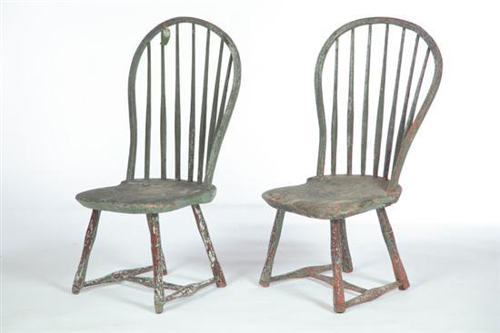 Appraisal: PAIR OF PAINTED BOW-BACK WINDSOR SIDE CHAIRS American late th