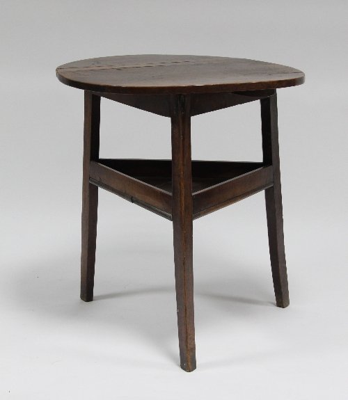 Appraisal: An th Century pine cricket table with tray stretcher cm