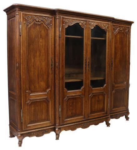 Appraisal: French Louis XV style oak breakfront bookcase early th c